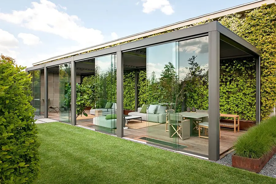 pergola with full glass panels that slide on a track
