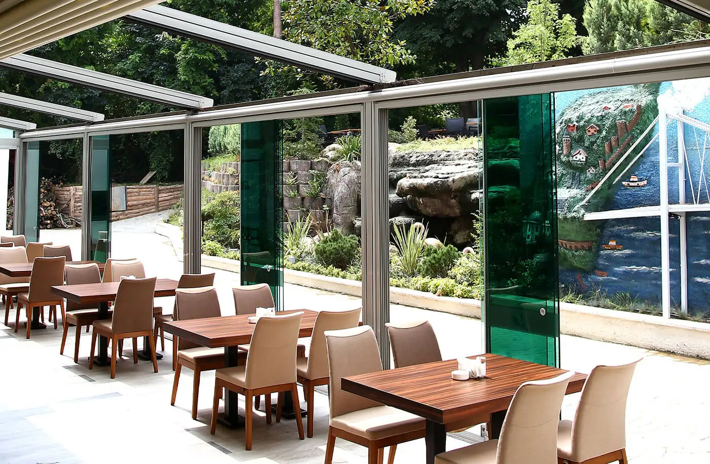 commmercial Skyvision pergola with Pier glass panels on sliding track