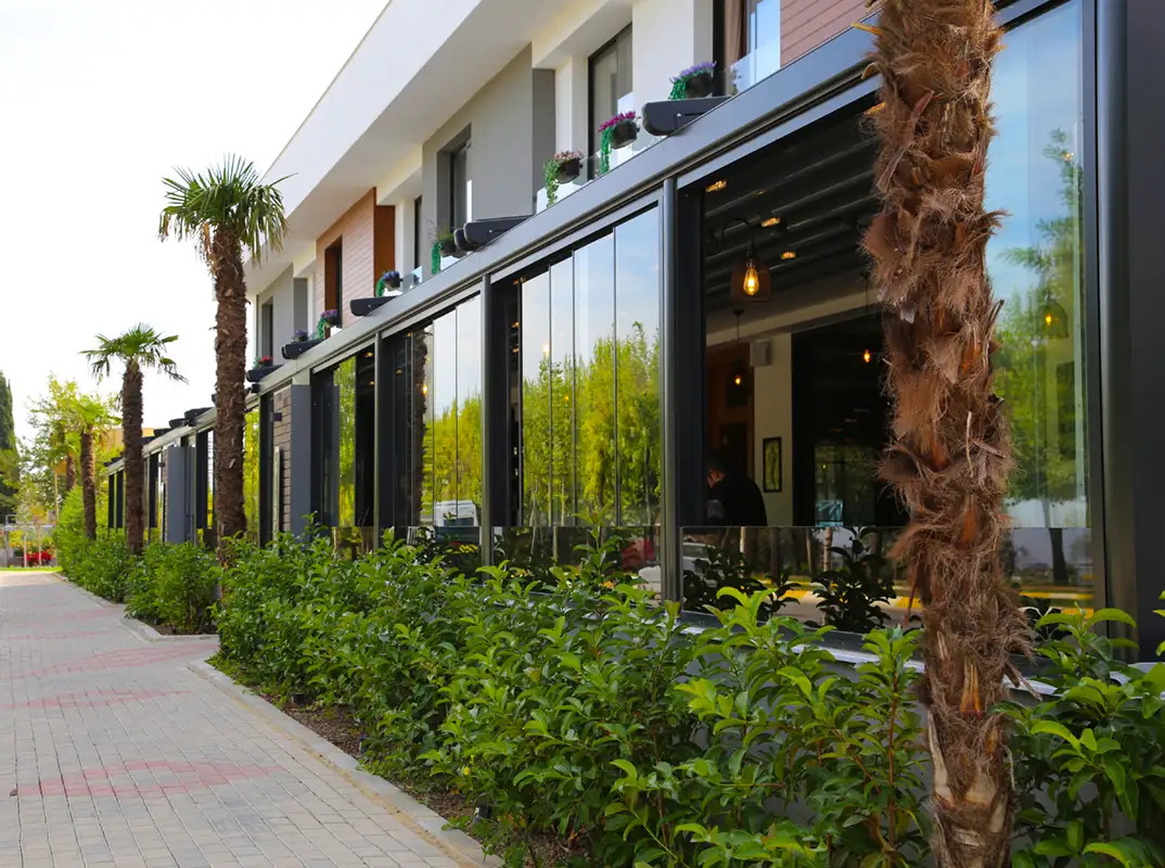 Bora glass system on commercial restaurant pergola